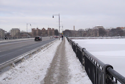 winter cyclist bridge sidewalk