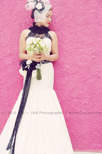 Chic mermaid style wedding dress with black lace detail designed by Doddie 