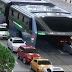 BRAVO!! China Unveils Elevated Train That Drives Over The Top Of Other Cars On The Road