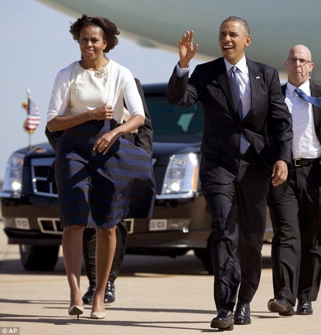 President to the Rescue - stops Michelle's skirt from blowing up in the wind