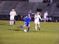 Meagan Proper (#2) dribbles through the defense