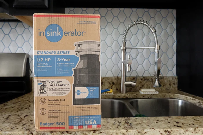 new InSinkErator garbage disposal in box