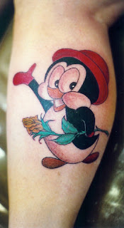 tiny cartoons tattoo