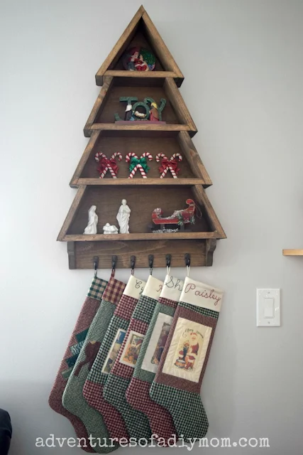 Christmas tree shelf with stockings