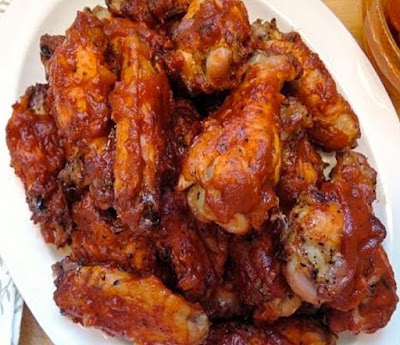 Baked Chicken Wings Tossed in BBQ-sauce Glazed with Honey