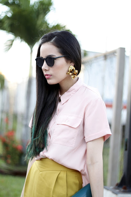 Lutfi Janania earrings and pastel pink blouse