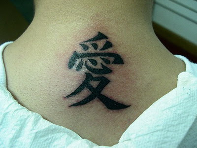 asian letter shoulder tattoo