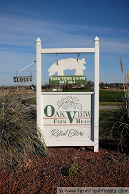 the entrance sign to Oakview Farm Meats store