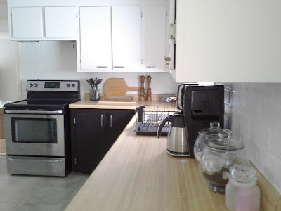 Black white tuxedo kitchen painted faux brick