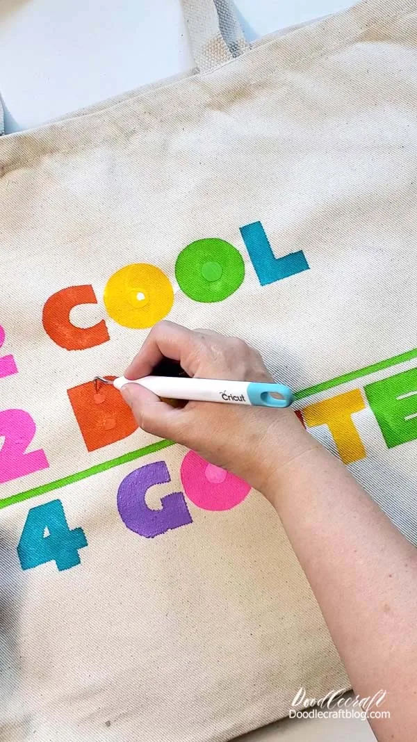 Use a pick tool to remove the center of the letters.   Then let the canvas tote bag dry completely and it's ready to fill with books, sports gear or notebooks for school!