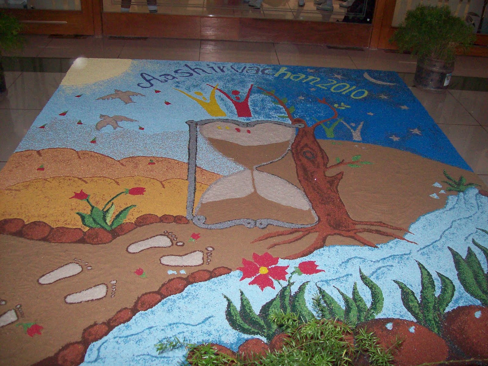 This is a rangoli I have shown before, drawn by the teachers, on the ...