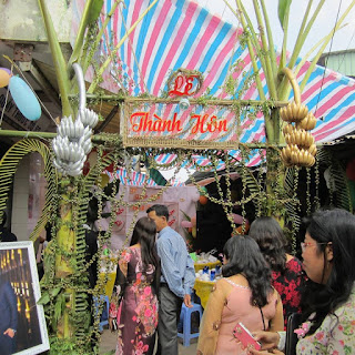 Những mẫu cổng hoa đám cưới bằng lá dừa