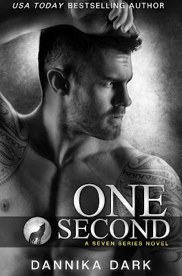 One Second book cover of a black-and-white image of a handsome man, one arm draped on top of his head as he looks to his left. He's shirtless, tattoos on his shoulders. Background is silvery-gray.