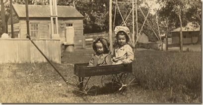 children two girls in darling vintage wagon (2)