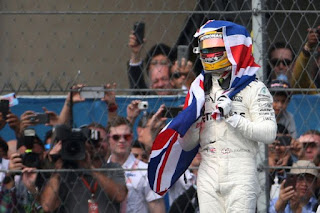 Motor Racing - Hamilton Takes Fourth Title Despite Collision