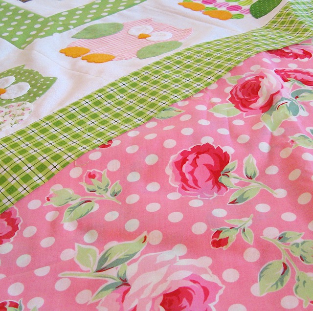 Preppy pink and green quilt with owls and roses