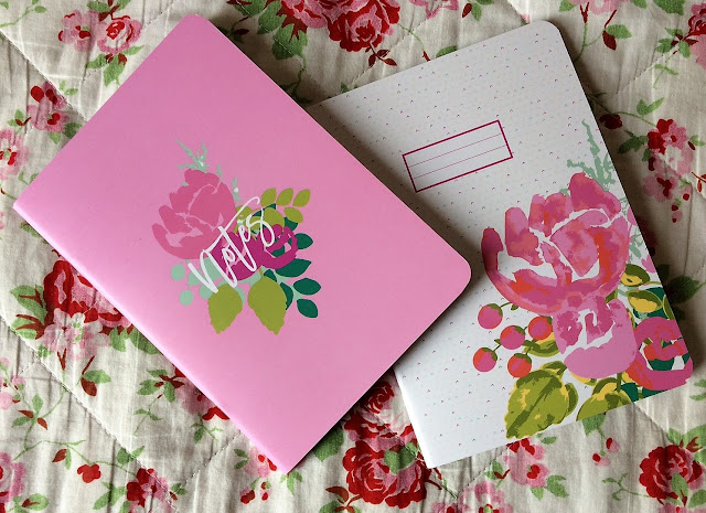 pink and white A5 notebooks