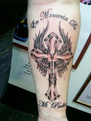 cross with flowers tattoos barbed wings tattoo. The cross with angel wings