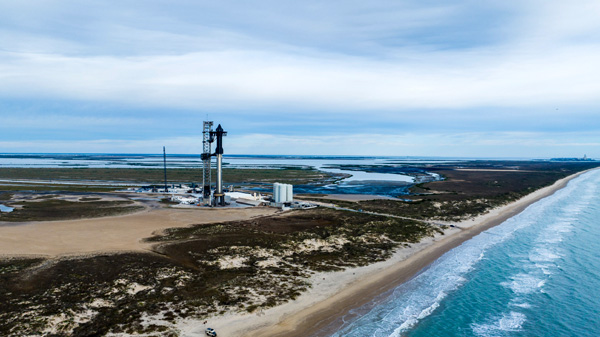 SpaceX's third Starship Super Heavy rocket stands tall at Starbase in Texas...on February 13, 2024.