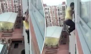 Hombre heroico arriesga su vida para salvar a un perro que cuelga del balcón de un rascacielos