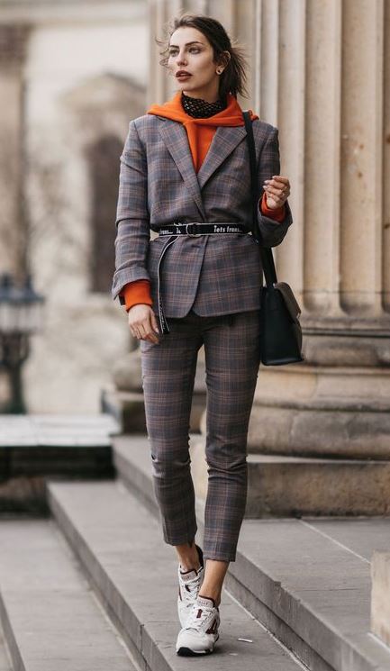 office outfit idea to copy this fall / plaid suit + sneakers + belt + orange hoodie