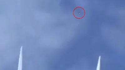Screenshot of the silver UFO Orb been chased by fighter Jet's in 2023.