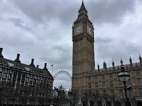 Shot taken from inside the grounds of the Houses of Parliament, showing the Elizabeth Tower (Big Ben) and the London Eye