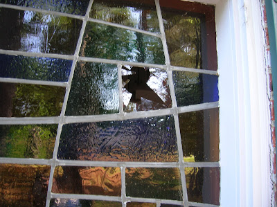 Broken stained glass window