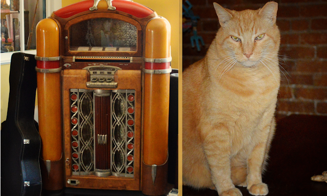 retro juke box, guitar, big orange cat