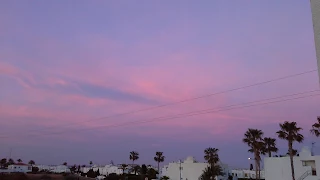 the sunsets pink across the skyline