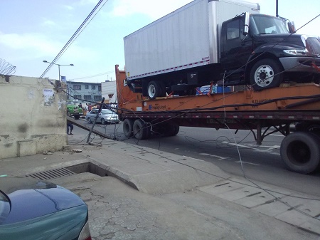 Photos: Trailer pulls down Electricity Poles, Cables in Ikeja