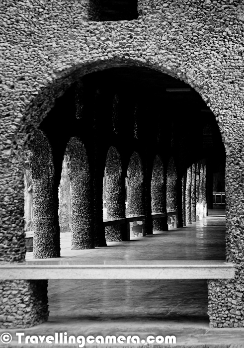 Recently we again visited Rock Garden of Chandigarh and it was again a delighting experience to see some creative stuff made out of junk or recycled material. Let's take a quick PHOTO JOURNEY to this wonderful place created by Mr. Nek Chand..Here is a photograph of a huge stone carved into a circular shape and looks like a tyre with a whole in middle. The text written over this stone in English and Urdu is saying that the place where this stone is located signifies the location from where Mr. Nek Chand started creating Rock Garden. There is a small hut at this place.There are many things made up of things like Bangels, Electric material, broken crockery etc. But some of them looked plain creations of cement and stone, like the ones shown in above Photograph. This may be something different which is not clear from the appearance of these ladies standing at a high wall in Rock Garden of Chandigarh, Punjab. The background has of course some broken pieces of tilesThe Rock Garden of Chandigarh is a Sculpture garden in Chandigarh, Punjab State of India which is also known as Nek Chand's Rock Garden after its founder Nek Chand, a government official who started the garden secretly in his spare time in 1957. Today Rock Garden is spread over an area of forty-acres and Rock Garden is completely built of industrial & home waste and thrown-away items... The very first photograph is my favorite but never able to understand that how these clay-pots can be considered as thrown-away or Home waste. From the structure, they look like placed together in original  form.Rock Garden is situated near Sukhna Lake and it comes before Lake when we go from Rose Garden. It consists of man-made interlinked waterfalls and many other sculptures that have been made of scrap & other kinds of wastes (bottles, glasses, bangles, tiles, ceramic pots, sinks, electrical waste, etc) which are placed in walled paths. Inside the Rock Garden there is a dedicated path which takes you through a guided tour till the end point and takes back to exit gate of Rock GardQuietly sitting men at Rock Garden of Chandigarh in Punjab State of India. It's really amazing to see such wonderful masterpieces and not sure who continue the good work till date. Rock Garden is one of the main tourist place of Chandigarh and probably each Tourist try to witness this marvelous piece of Art.Towards the end of Rock Garden, there is a huge ground. This place is one of the popular picnic station for children. Lot of space to play, enjoy Camel ride and much more around the space. There is a huge complex with different types of mirrors installed. These mirrors are some special effect mirrors which make you small, tall, distorted with various angles etc. It's fun to spend some time in front these mirrors and do some laughter-therapy :)There are some water bodies inside the Rock Garden which makes this place more interesting. Apart from two man-made waterfalls, there are some canals around the place and kids love to play around these. This places are also more popular for Photography :)During spare time, Mr. Nek Chand began collecting materials from demolition sites around the city. He recycled these materials into his own vision of the divine kingdom of Sukrani choosing a gorge in a forest near Sukhna Lake for his work. The gorge had been designated as a land conservancy, a forest buffer established in 1902 that nothing could be built on. Chand’s work was illegal, but he was able to hide it for eighteen years before it was discovered by the authorities in 1975. By this time, it had grown into a 12-acre (49,000 m2) complex of interlinked courtyards, each filled with hundreds of pottery-covered concrete sculptures of dancers, musicians, and animals.People of different ages and fro various walks of life come to this place with different expectations. Nowadays Rock Garden has become one of the main place for city couples, but of-course not as good as Rose Garden :) ... I remember one of the visit to Rock Garden, when we had to come back as it was full of young couples and we had started feeling guilty about the fact that we were breaking their privacy. This time, it was completely different and I was happy to see everyone enjoying in their own way, without any problems.Children with their Mom at Rock Garden and their Dad clicking a memorable moment at Chandigarh, Punjab !Whatever Mr. Nek Chand was doing was in serious danger of being demolished but he was able to get public opinion on his side and in 1976 the park was inaugurated as a public space. Nek Chand was given a salary under title 'Sub-Divisional Engineer, Rock Garden' and a workforce of 50 laborers so that he could concentrate full-time on his work. It even appeared on an Indian stamp in 1983. The Rock Garden is still made out of recycled materials, and with the government’s help, Nek Chand was able to set up collection centers around the city for waste, especially rags and broken ceramicsWhen Mr. Nek Chand left the country on a lecture tour in 1996, the city withdrew its funding and vandals attacked the park. The Rock Garden Society took over the administration and upkeep of this unique visionary environment. The garden is visited by over five thousand people daily with a total of more than twelve million visitors since its inception which is incredible.So apart from Sukhna Lake, Rose Garden, Sector-17, Shanti Kunj, Sector-42 Lake; Rock Garden is one of the main place to visit in Chandigarh and it's a worth a visit. 