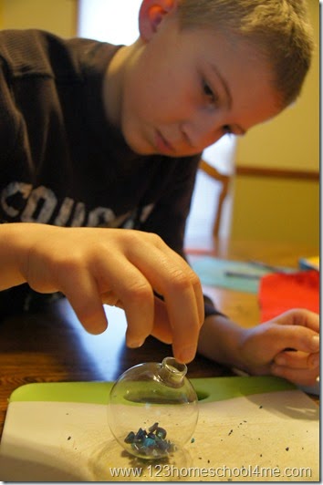 kids will love helping to make a melted crayon chrsitmas ornament craft