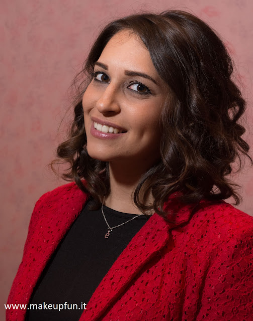 woman smiling red jacket