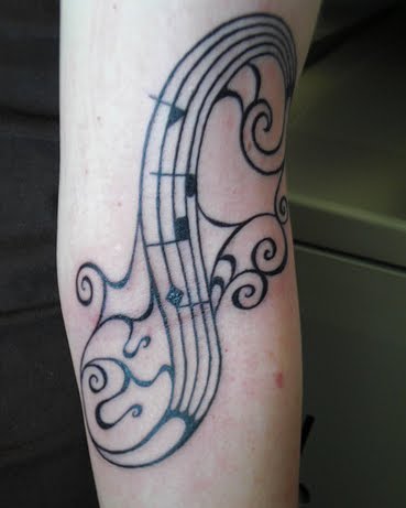musical tattoo designs. dresses Music Note Tattoos