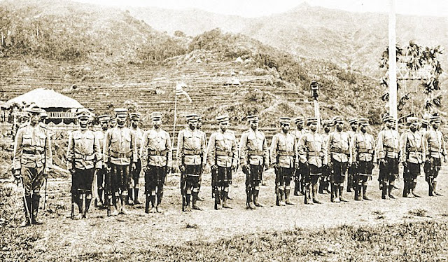 Ifugao men with rifles