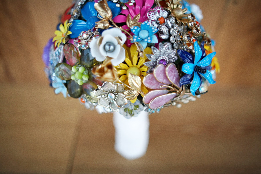This brooch bouquet is so cute and it lasts way past the wedding