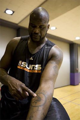 Shaquille O'Neal Bull Eye Tattoos