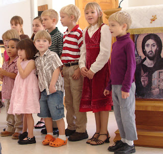 kids singing in worship at King of Peace January 2007