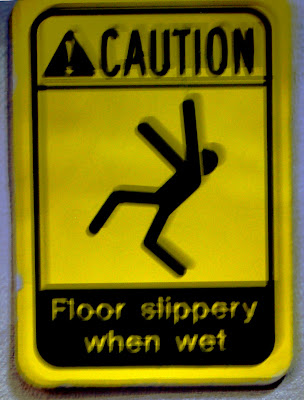slippery when wet sign. a quot;slippery when wetquot; sign