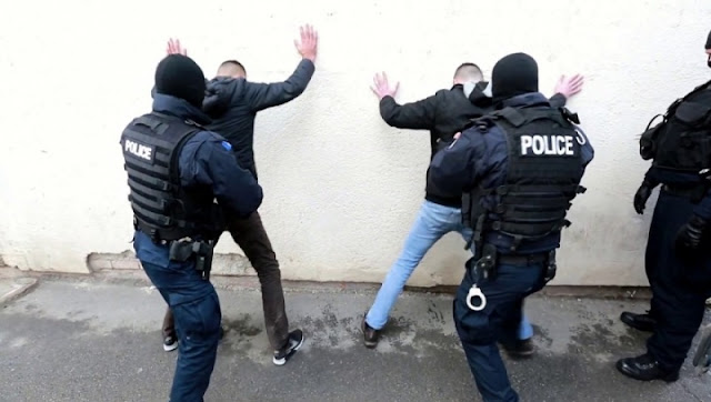 albanian officers while arresting two persons in tirana