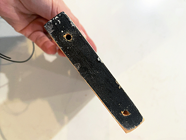 drilled holes in edge of board
