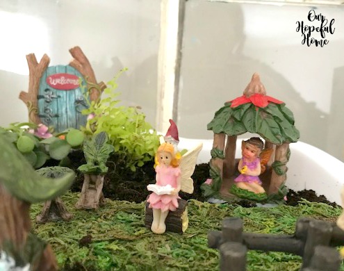 fairy garden fairy sitting reading book welcome door pagoda