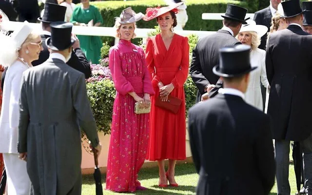 The Princess of Wales wore a red dress by Alexander McQueen. The Duchess of Edinburgh wore a pink dress. Princess Beatrice