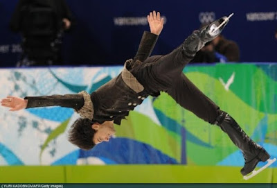 Stephane Lambiel Olympic figure skater men's short program screencaps images spin photo pictures screengrabs video capture