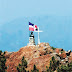 DUARTE Y LA BANDERA EN EL PUNTO MAS ALTO DEL PAIS