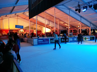 skating rink with view of bar