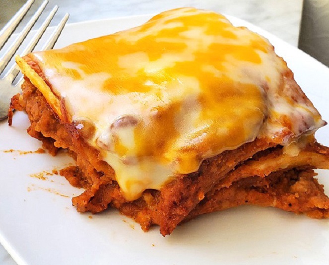 this is a slice of flour tortilla Mexican layered lasagna