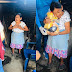 Mexican lady receiving a food package from a food bank project during this crisis