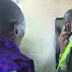 Watch as President Kenyatta Uses a 'Mulika Mwizi' Phone